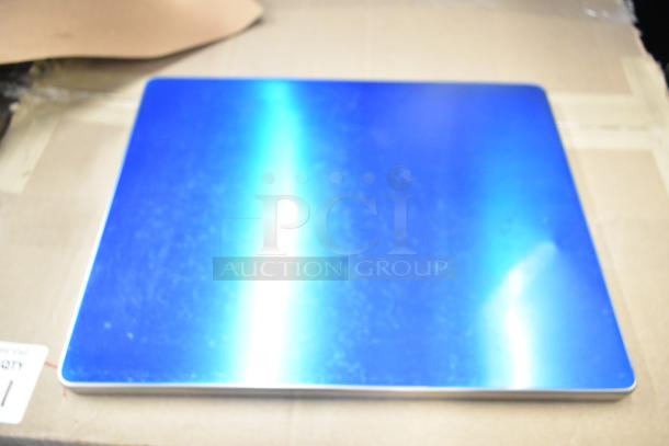 Mettler Toledo FreshWay Scale, blue surface, 100-240 volts, 1 phase, on cardboard background, pristine condition.