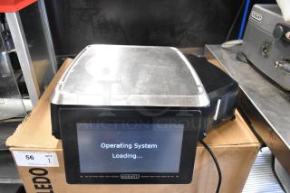 2024 Hobart HTi-7LH4W commercial countertop scale, stainless top, digital display shows "Operating System Loading," tested working.