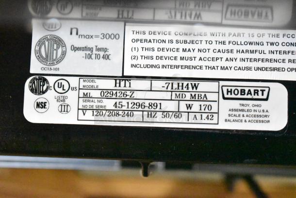 2024 Hobart HTi-7LH4W commercial scale label, 120/208-240V, model info and certifications visible, tested and working.