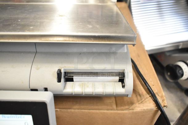 Mettler Toledo AM-5545 Commercial Countertop Scale, 100-240 Volts, 1 Phase, tested and working, minor surface wear.