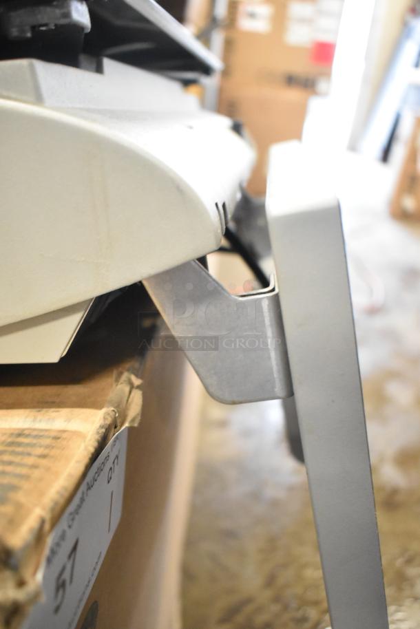 Mettler Toledo AM-5545 commercial countertop scale, 100-240 volts, 1 phase, tested and working, silver finish.