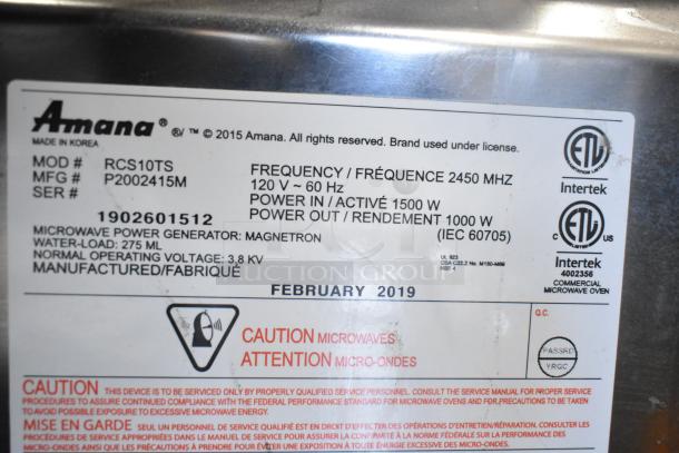 2019 Amana RCS10TS commercial microwave, 120V, 1 phase, label showing model, frequency, and safety warnings.