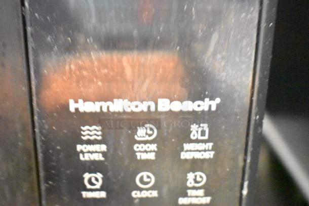 2024 Hamilton Beach HB61B100027880 Countertop Microwave Oven, 120V, with control panel showing settings. Note: glass broken.