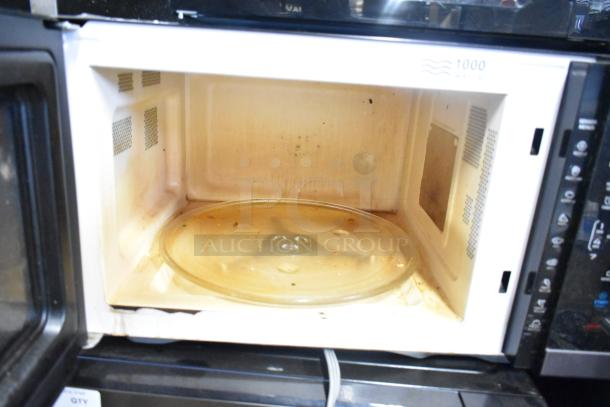 Hamilton Beach HB61B100027880 countertop microwave, broken glass plate visible, 120 volts, 1 phase, 2024 model.