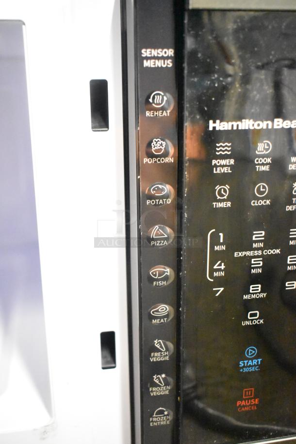 2024 Hamilton Beach HB61B100027880 countertop microwave oven, featuring sensor menus for reheat, popcorn, and more.