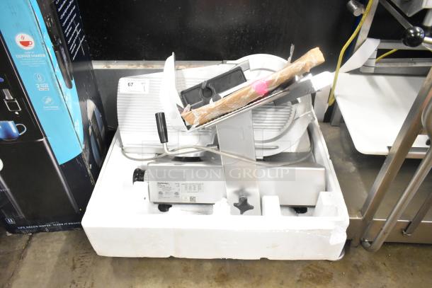 Bizerba GSP HD Commercial Meat Slicer, 120 Volts, 1 Phase, shown in original packaging; features safety guard and sleek design.