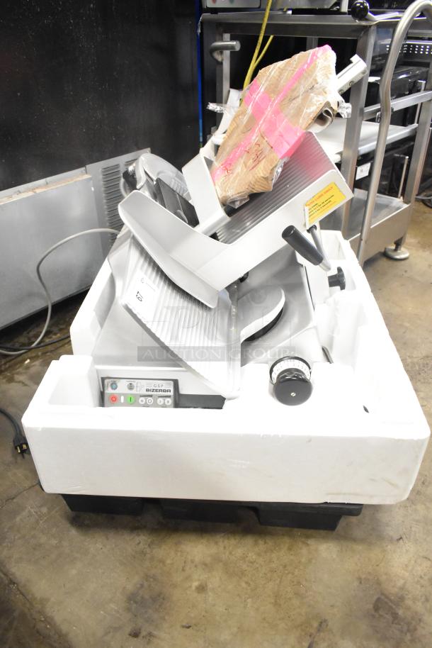 Bizerba GSP HD commercial meat slicer, 120V, 1 Phase, in packaging. Features control panel and thickness dial.