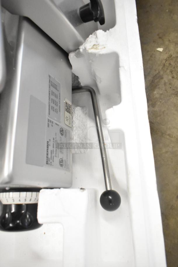 Bizerba GSP HD Commercial Meat Slicer in packaging. Visible labels with model and safety certifications. 120 Volts, 1 Phase.