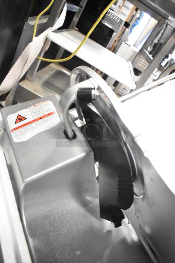 Bizerba GSP HD Commercial Meat Slicer, 120 Volts, 1 Phase, shown with safety and warning labels, in good condition.