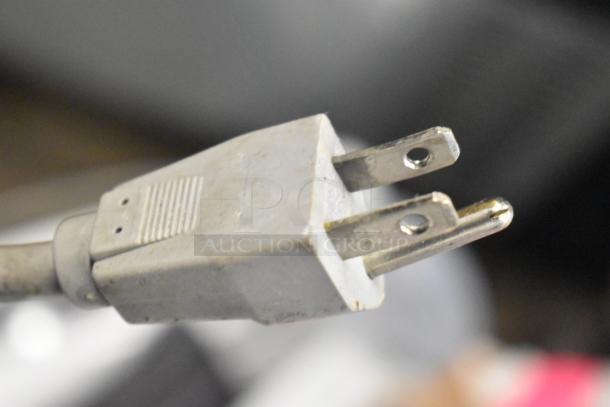 Alt text: Close-up of a power plug for Bizerba GSP HD Commercial Meat Slicer, showing a standard 120-volt, 1-phase plug.
