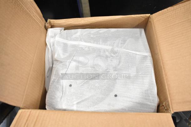 Primo Bottom Loading Water Dispenser in original box, wrapped in protective white material, appears unused.