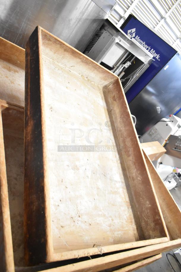 Seventeen various wooden bins, rustic and used, in varying conditions. Stackable design, suitable for storage or display.