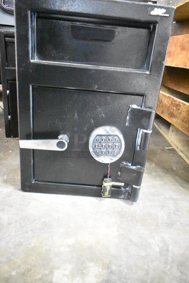 Brand new 360 Office Furniture black steel depository safe, 14"x14"x20". Features electronic keypad lock. Model 911DS202.