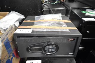 BRAND NEW SCRATCH AND DENT! 360 Office Furniture 16 1/2" x 14 1/2" x 7 7/8" Black Steel Hotel Safe with Electronic Keypad Lock 911HS082