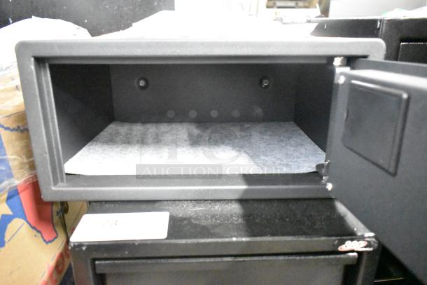 BRAND NEW 360 Office Furniture black steel hotel safe, 16.5"x14.5"x7.875", with electronic keypad lock, model 911HS082.