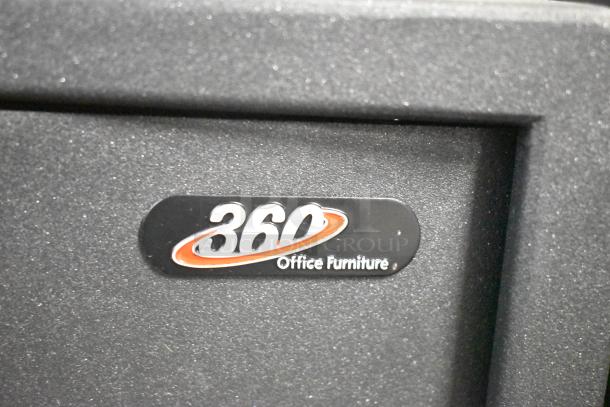 "Brand new black steel hotel safe by 360 Office Furniture, 16.5x14.5x7.875 inches, electronic keypad, model 911HS082, with minor scratches and dents."