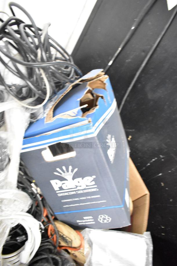 Pallet lot with Belden 1700A cable, Paige cable box, and assorted wires. Visible damage on Paige box.