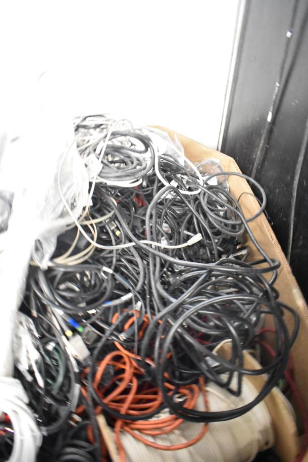 Pallet lot with assorted Belden 1700A, Paige cables, and wires in mixed colors, ideal for bulk purchase.