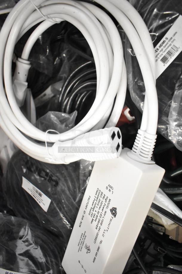 Pallet with Belden 1700A cable, Paige cable, and assorted wires; white cables coiled and labelled for organization.