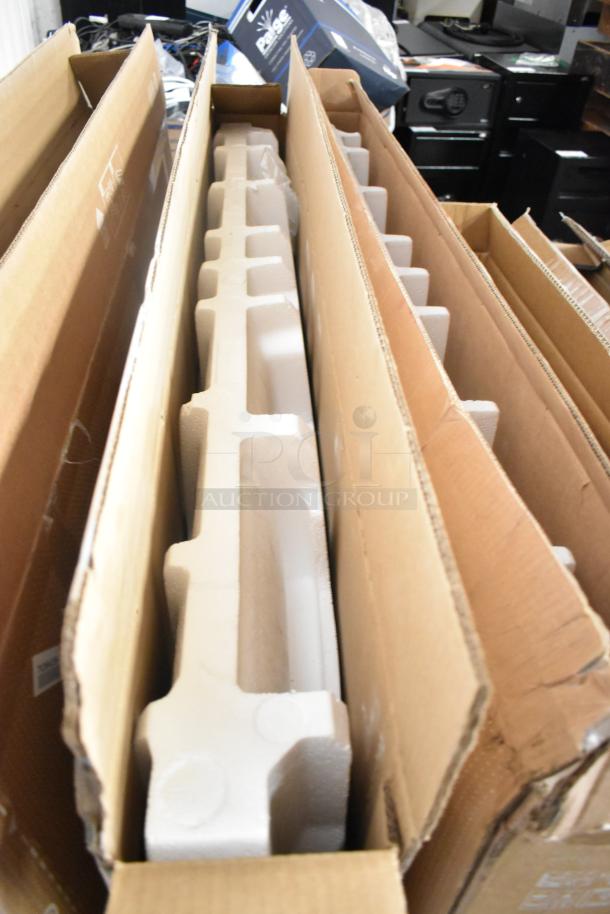 Three Samsung QM55C 55" TVs in original boxes, foam packed. New condition. Local pickup only.