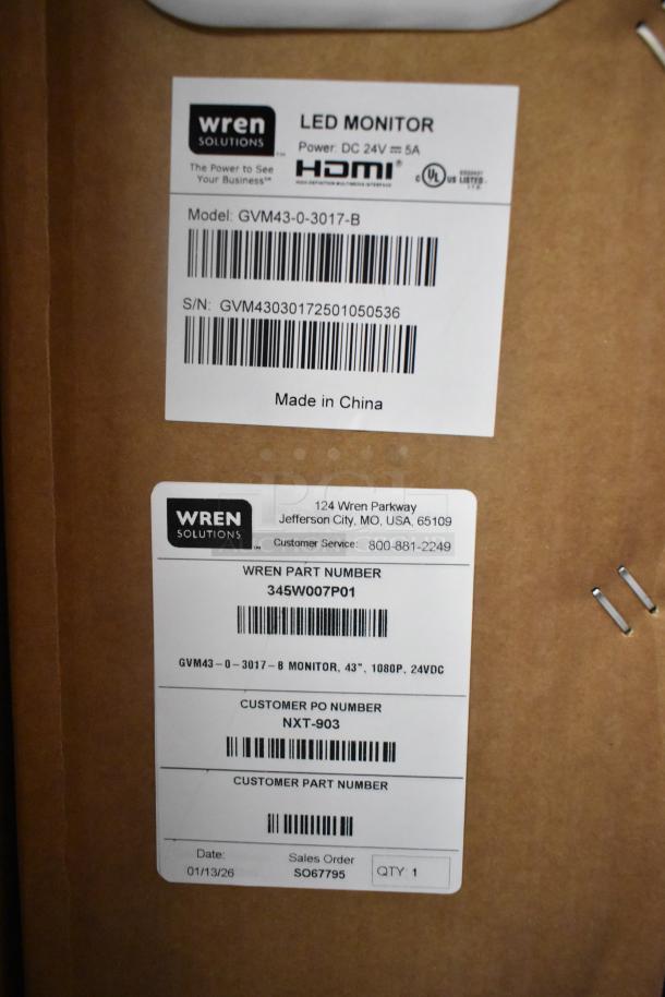 Three Wren GVM43-0-3017-B LED monitors in original box, 43" 1080p, new condition. Pickup only. Labels show model and serial numbers.