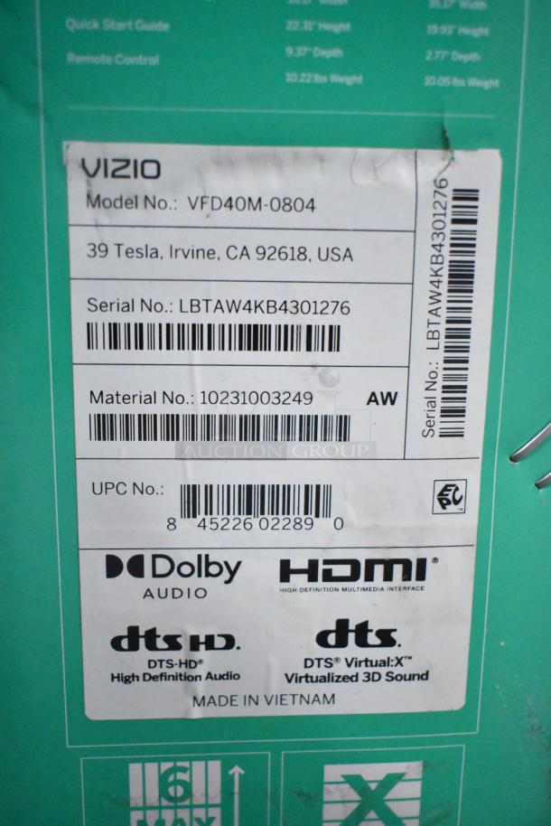 Label on Vizio TV box, model VFD40M-0804. Includes serial number, material number, Dolby Audio, HDMI, DTS-HD logos.