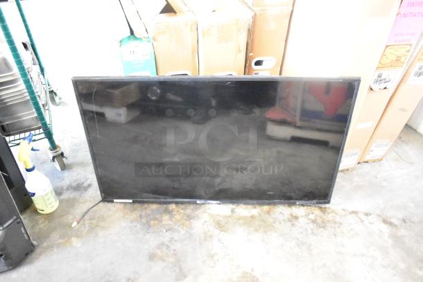 Four unboxed televisions, including Vizio VFD40M-0804, Vizio VQD50S-0809, Philips 55PUL7552/F7, and Wren GVM43-0-3016-B. Buyer pickup required.