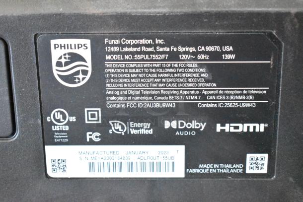 Philips label on TV model 55PUL7552/F7, manufactured Jan 2023, UL listed, Dolby Audio, HDMI, FCC compliant.