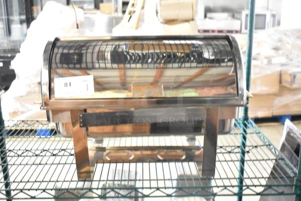 Countertop roll top chafing dish, stainless steel, with roll-top lid and sturdy legs, shown in excellent condition on a wire shelf.