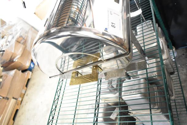 Countertop roll top chafer with stainless steel finish, brass accents, and roll-top lid. Item label indicates "81".