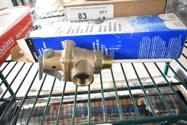 8 brand new scratch and dent items including Delfield coil evaporator, TR36 ticket rack, Watts safety relief valve, water pressure regulator, wires.