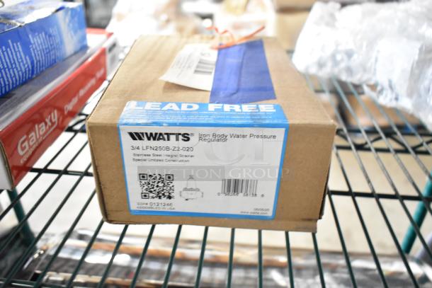 Box labeled Watts 3/4 LFN250B-Z2-020 Iron Body Water Pressure Regulator, Lead-Free, on shelf, brand new condition.