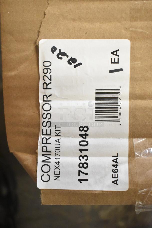 Brand new Embraco NEX4170UA compressor, 115-127V, 1 phase. Label reads "Compressor R290 NEX4170UA KIT."