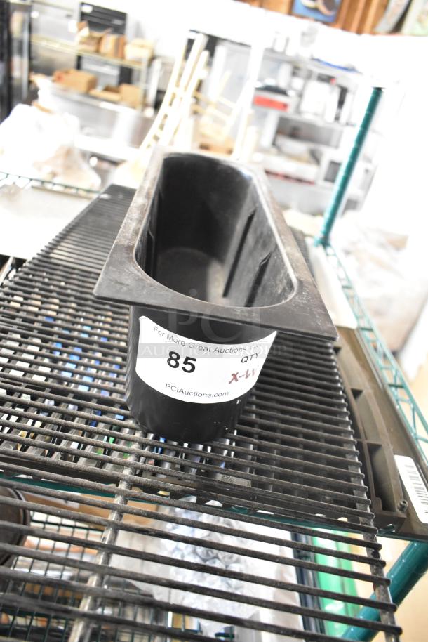Plastic bin with auction label "85, QTY X-1" from PCI Auctions. Good condition, part of a multi-item lot.