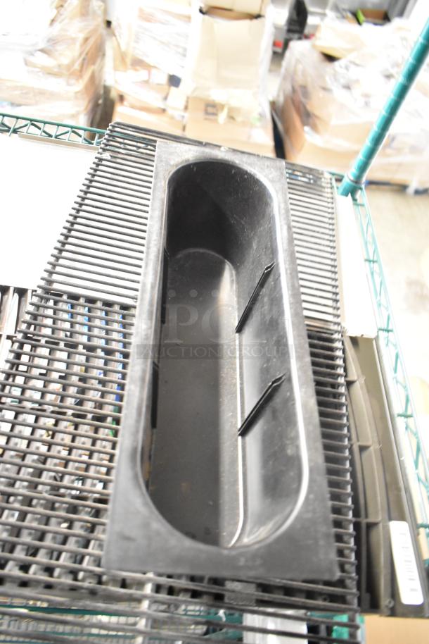 Black ice head vent cover with grate design, slightly worn, part of auction lot of 6 items including jar, blade sharpener.