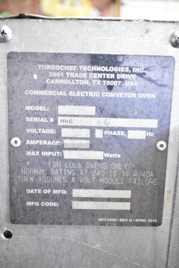 Turbochef HhC2020 commercial electric conveyor oven label showing model, voltage, and manufacturing details.