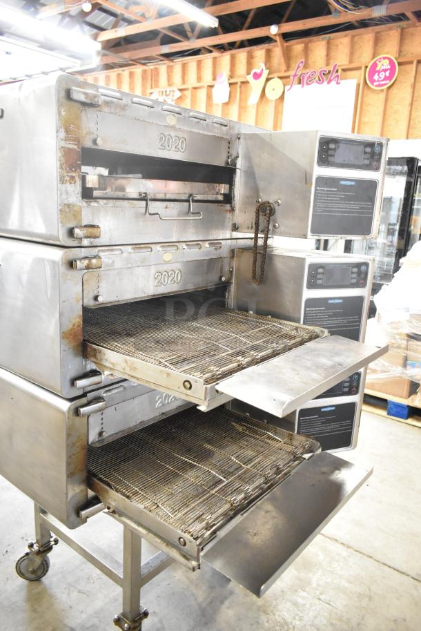 Three 2016 Turbochef HhC2020 commercial electric conveyor ovens on casters, 208/240V, 3-phase, showing wear.