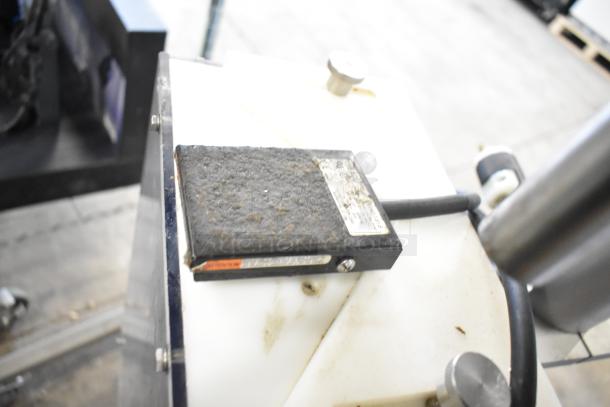 Per-fil Micro-15 floor filler machine with commercial casters, visible wear on control box. 125 volts, 1 phase.