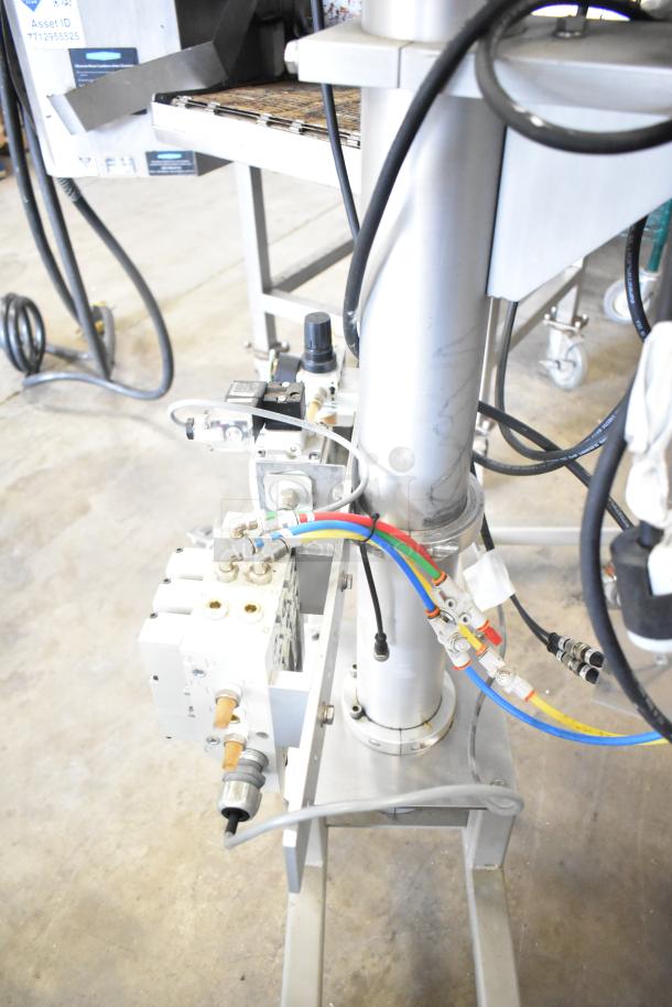 Per-fil Micro-15 floor filler machine, 125V, 1 phase, on commercial casters. Visible wiring and controls.