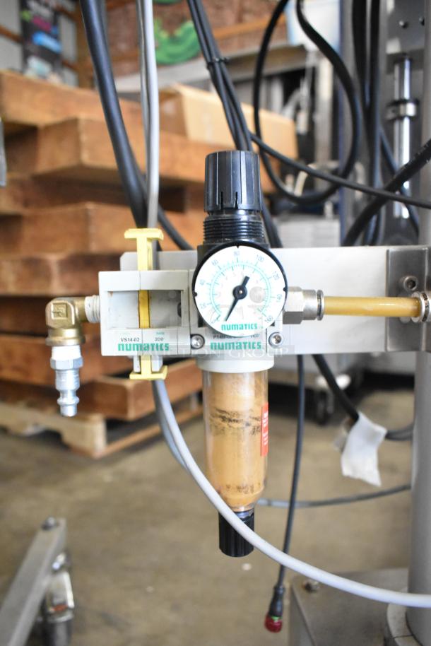 Per-fil Micro-15 floor style filler machine with gauge, commercial casters, 125V, 1 phase, Numatics fittings visible, used condition.