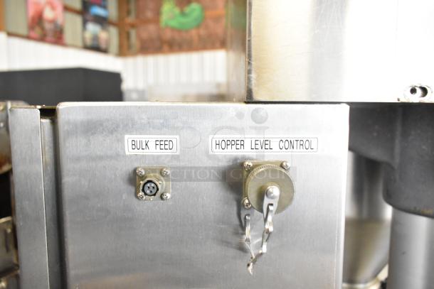 Per-fil Micro-15 commercial floor filler machine on casters, 125V, 1 phase. Features bulk feed, hopper level control.