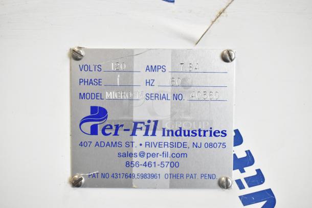 Per-fil Micro-15 Filler Machine label showing 120 volts, 7.84 amps, model number, serial number, and contact details.