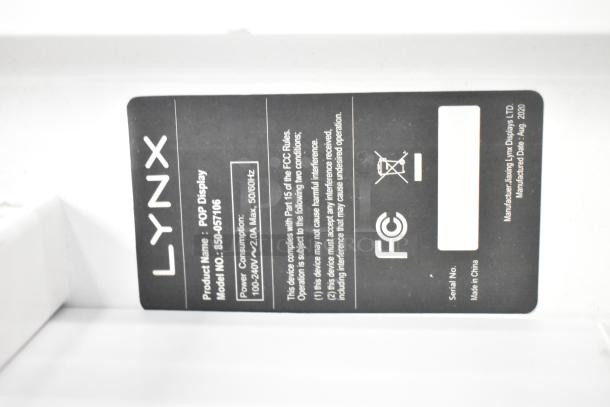 Label on Lynx POP Display, Model 850-057106, power consumption 100-240V/2.0A, FCC compliant, manufactured August 2020.