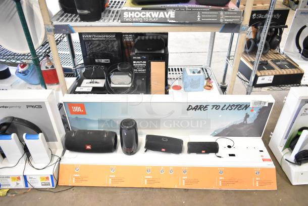 3 store displays with TonieBox, JBL speakers, and Altec speakers in good condition, showcasing audio quality and features.