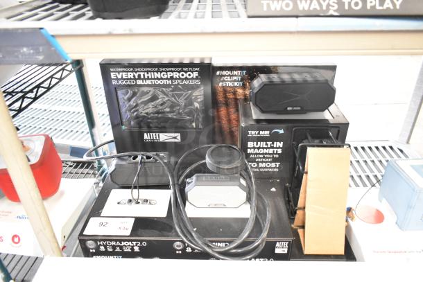 3 store displays featuring TonieBox, JBL speakers, and Altec Lansing speakers. Includes built-in magnets and promotional materials.