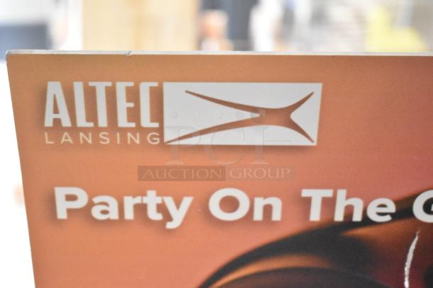 Altec Lansing speaker sign with the slogan "Party On The Go" displayed prominently.