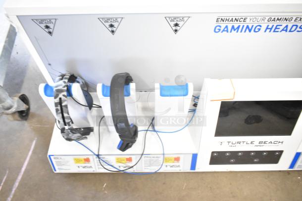 Three store displays: TonieBox 2s, Turtle Beach headphones, Sonos sound bar. Features Turtle Beach logos and price tags.