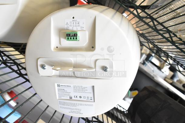 Electro-Voice EVID-P6.2UW speaker showing input panel and label with specifications and installation instructions.