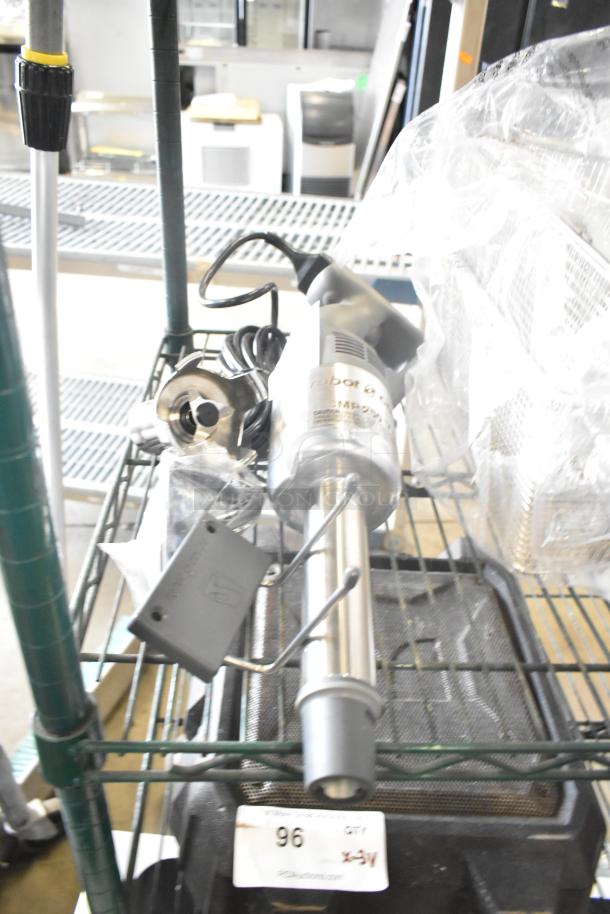 Brand new Robot Coupe CMP250VV 10" variable speed immersion blender, 1/2 HP, 120V, showing minor scratches and dents.