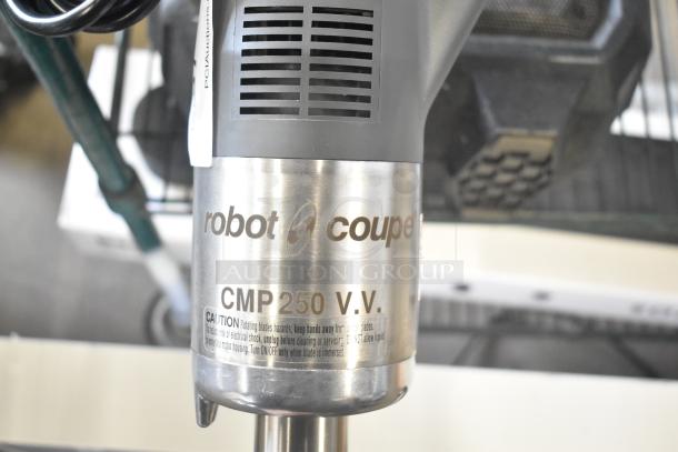 Brand new Robot Coupe CMP250VV 10" immersion blender, 1/2 HP, 120V, with scratches, labels showing model and safety warnings.